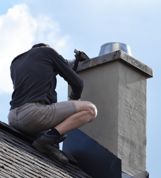 Certified Chimney Inspections on a roof performing a level 1 chimney inspection